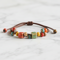 LUMA | Lieblingsarmband mit Knotenverschluss und Keramik-Accessoires
